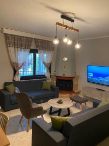 Χώρος καθιστικού στο Villa Helen