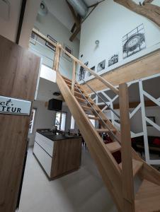 a loft office with a staircase and a desk at Maison des Artistes Paris Giverny in Vernon +38 photos