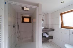 a bathroom with a shower and a sink at Le studio in Turckheim
