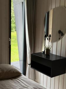 Postel nebo postele na pokoji v ubytování Tondikaku Holiday Home
