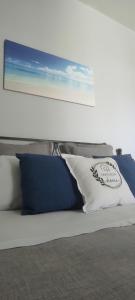 A bed or beds in a room at CAPERCIA home