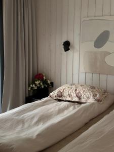 Postel nebo postele na pokoji v ubytování Tondikaku Holiday Home