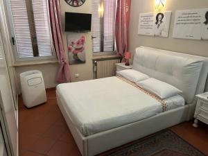 Ένα ή περισσότερα κρεβάτια σε δωμάτιο στο Beautiful House Isabella Spoleto centro +23 φωτογραφίες