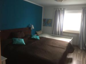 a bedroom with a bed with a large window at Seaapartment in Konstanz on Constance Lake in Konstanz