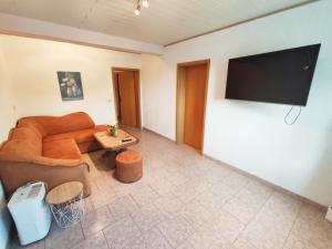 TV a/nebo společenská místnost v ubytování Apartments Rafael