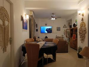 TV a/nebo společenská místnost v ubytování Moonland + 2 fotografie