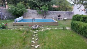 Πισίνα στο ή κοντά στο Appartement dans maison de caractère avec piscine