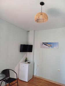 Sjónvarps- og/eða afþreyingartæki á Guest House Guriani