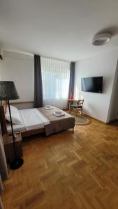 Postel nebo postele na pokoji v ubytování Central Rooms