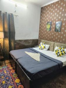 Postel nebo postele na pokoji v ubytování Hotel metroview