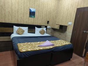 Postel nebo postele na pokoji v ubytování Hotel metroview