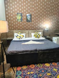 Postel nebo postele na pokoji v ubytování Hotel metroview