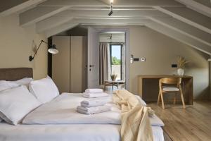 Ένα ή περισσότερα κρεβάτια σε δωμάτιο στο Villa Madora +32 φωτογραφίες