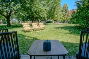 Taman di luar Einzigartiges Wohnen mit direktem Zugang zum Bürgerpark