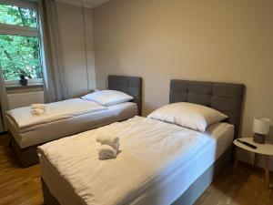 Postel nebo postele na pokoji v ubytování Ruhrperle Apartment 3 Essen + 12 fotografií