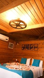 Postel nebo postele na pokoji v ubytování Kabak Misafir Evi