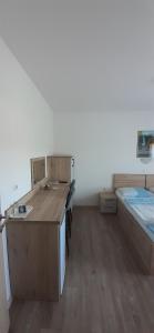 Katil atau katil-katil dalam bilik di Bed and Breakfast Brko