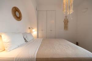 Postel nebo postele na pokoji v ubytování Villa Enthera Mykonos + 37 fotografií