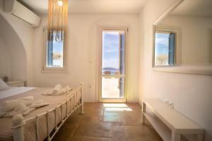 Postel nebo postele na pokoji v ubytování Villa Enthera Mykonos
