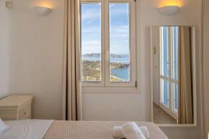 Postel nebo postele na pokoji v ubytování Villa Enthera Mykonos
