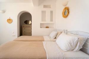 Postel nebo postele na pokoji v ubytování Villa Enthera Mykonos