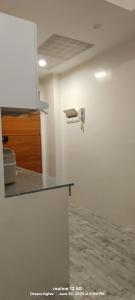 a kitchen with a counter and a counter top at Thyme residences condominium, Unit 208 in Cebu