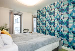 Łóżko lub łóżka w pokoju w obiekcie Classy Apartments - Ruska
