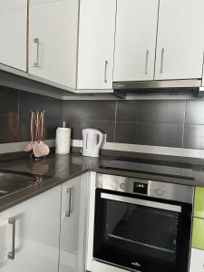 Kuchyň nebo kuchyňský kout v ubytování Piso con terraza a 5 min del mar