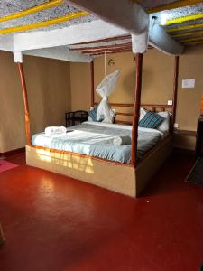 a bed in a room with a bunk bed at Bookup 5 bedroom house with a pool ngong in Kiserian