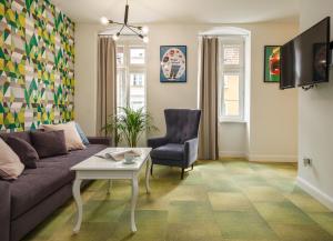 Telewizja i/lub zestaw kina domowego w obiekcie Classy Apartments - Ruska