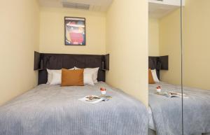 Łóżko lub łóżka w pokoju w obiekcie Classy Apartments - Ruska