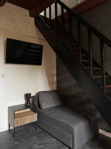 Un lugar para sentarse en Aloha Apartments Gryfa Pomorskiego