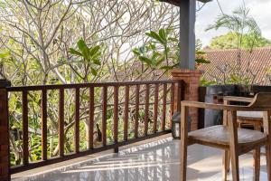 Balkón nebo terasa v ubytování Bramasa Ubud Guest House
