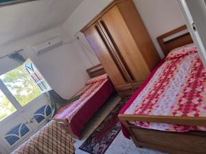 Postel nebo postele na pokoji v ubytování شاليه كبير مكيف مرسيليا 1