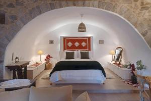 Postel nebo postele na pokoji v ubytování Theta Guesthouse