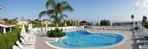 The swimming pool at or close to Graceland rooms and suites