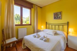 Ένα ή περισσότερα κρεβάτια σε δωμάτιο στο villa escalante