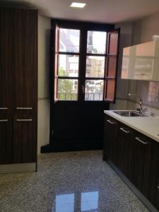 Kuchyňa alebo kuchynka v ubytovaní Apartamento Capitania