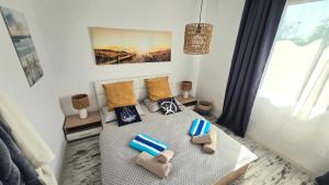 a bedroom with a bed with pillows on it at Sea View Luxury 1-bd Apartment Marina Cape Aheloy in Aheloy +56 photos