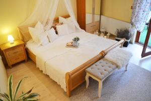 Posteľ alebo postele v izbe v ubytovaní Gyula Wellness Villa