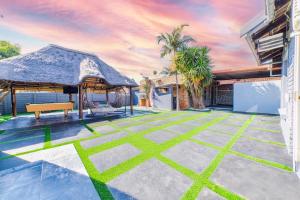 an outdoor patio with a gazebo and a bench at Homes of Ace 3 bedroom Villa in Pretoria