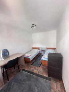 Postel nebo postele na pokoji v ubytování Dos Guesthouse