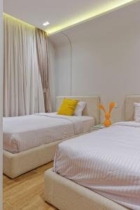 Postel nebo postele na pokoji v ubytování VESTA - Cairo Residence