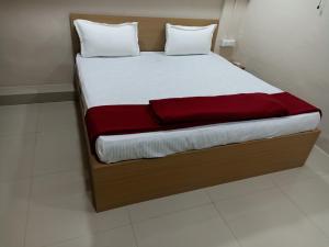 Postel nebo postele na pokoji v ubytování KK Guest House