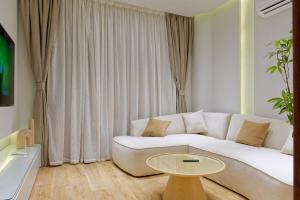 TV a/nebo společenská místnost v ubytování VESTA - Cairo Residence