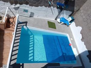 Bazén v ubytování Villa de Ingenio JAVAZU nebo v jeho okolí