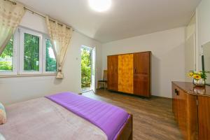Posteľ alebo postele v izbe v ubytovaní Villa Urlic