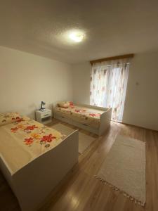 Postel nebo postele na pokoji v ubytování Anes House + 3 fotografie