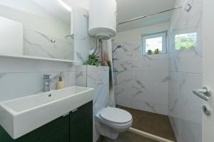 Kúpeľňa v ubytovaní Villa Urlic
