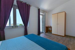 Posteľ alebo postele v izbe v ubytovaní Villa Urlic